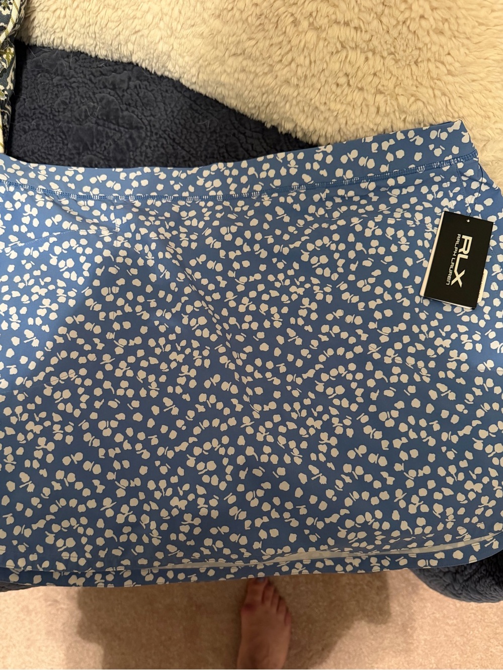 RLX Golf Skort. NWT. Size XL. Cobalt blue with polka dots